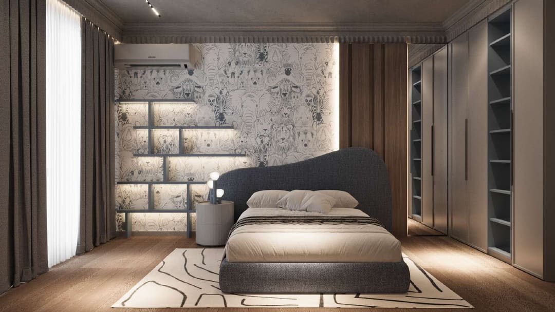 Bedroom with a grey bed and lit niches